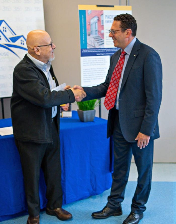 Rafael Pagan Jr., Executive Director of Pacific House and Chris Farrugio of the Stamford Rotary Trust Fund.